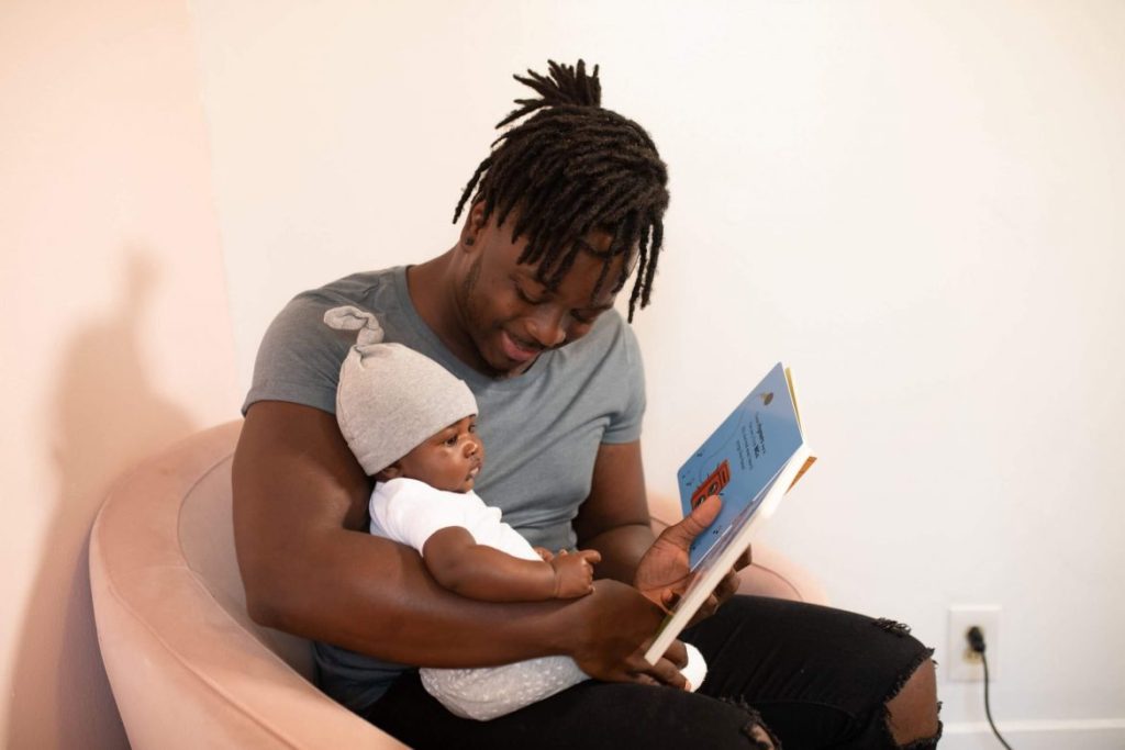 parenting advice daddy holding baby
