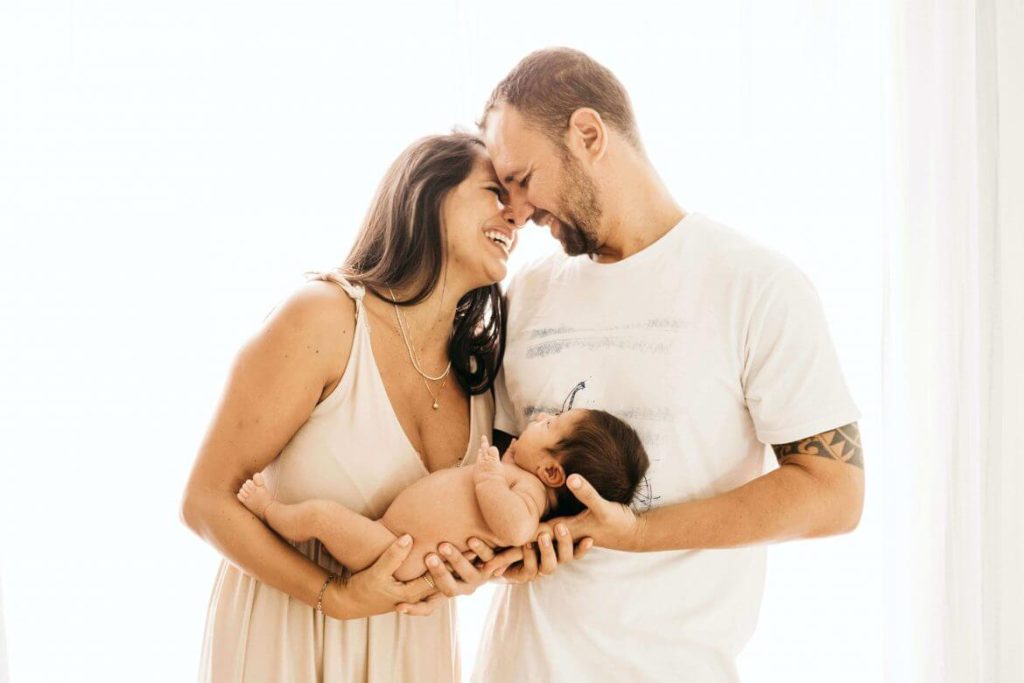happy couple newborn baby